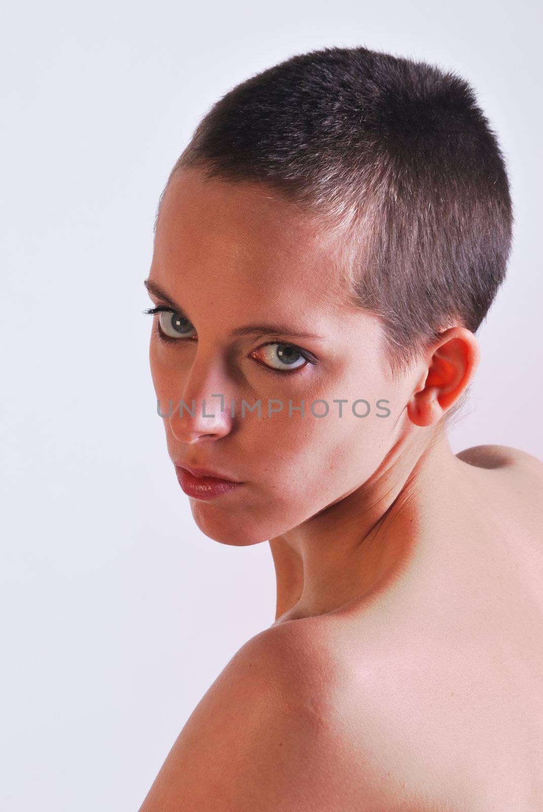 Woman with short hair facing camera