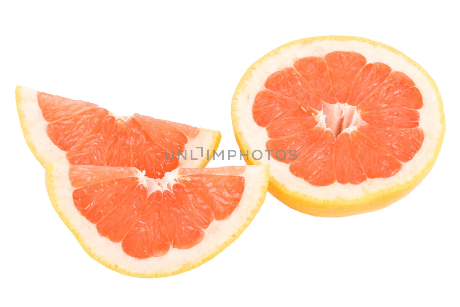 close-up peaces of red grapefruit, isolated on white