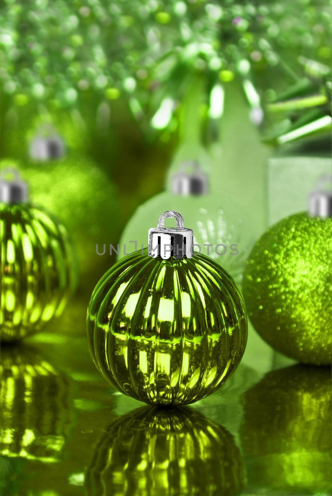 Green christmas ornaments with star background