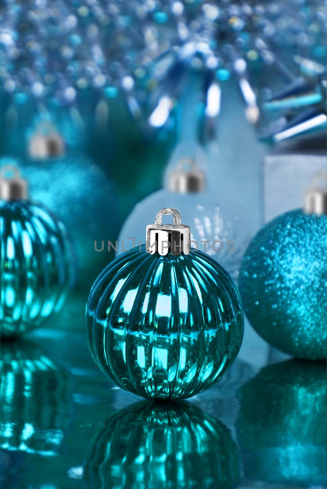Blue christmas ornaments with star background by tish1