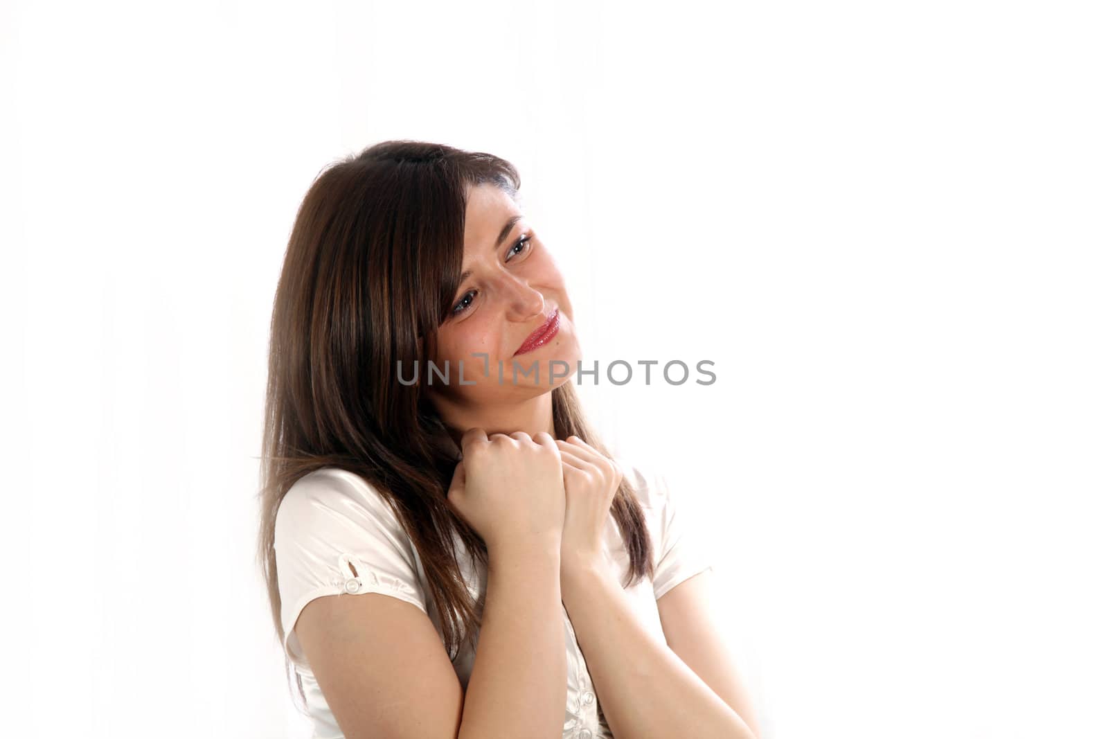 Young woman looking forward - to be happy - smiles and looks to the right - horizontal