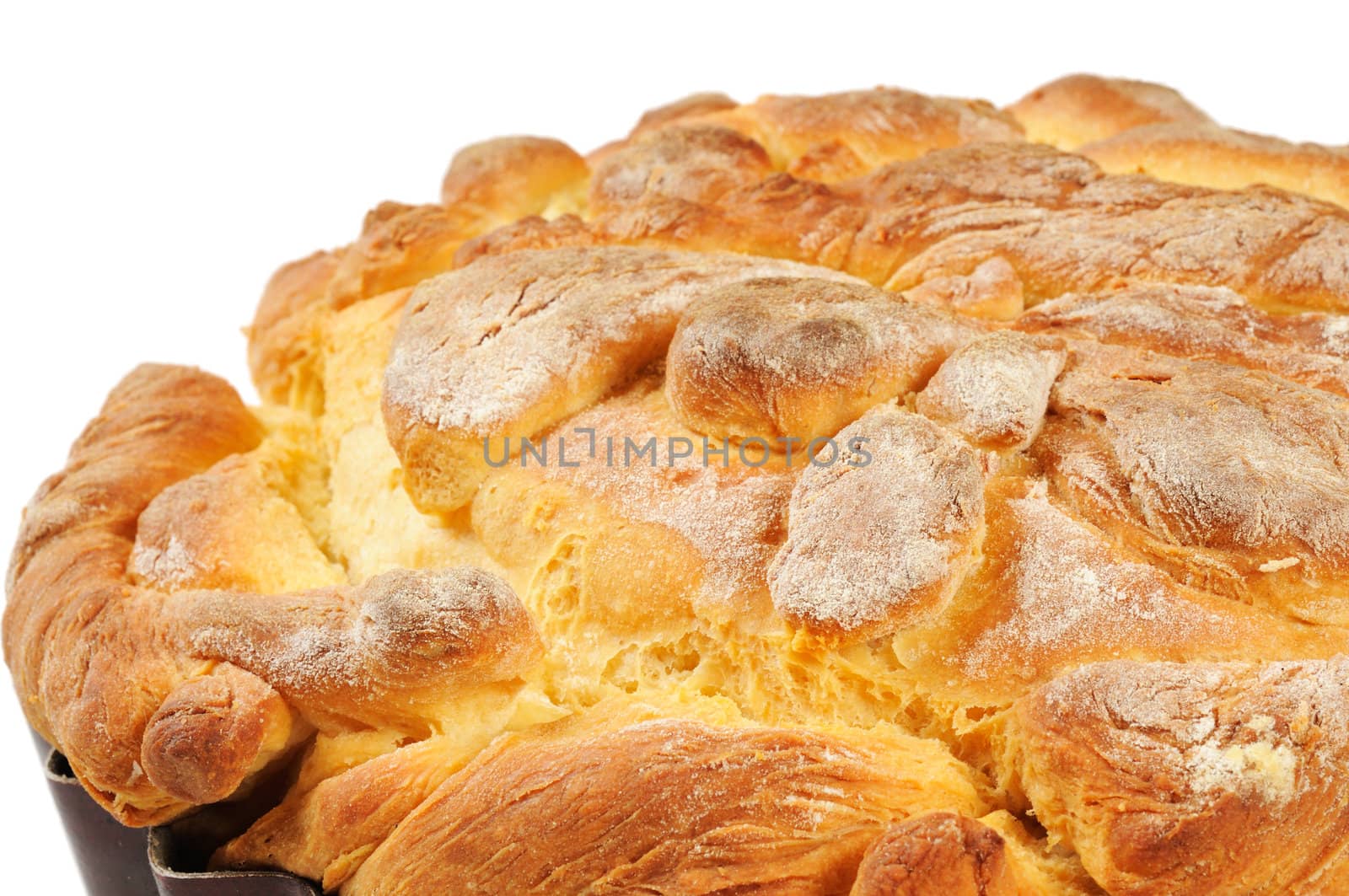 Homemade bread - a loaf. Isolated on white.