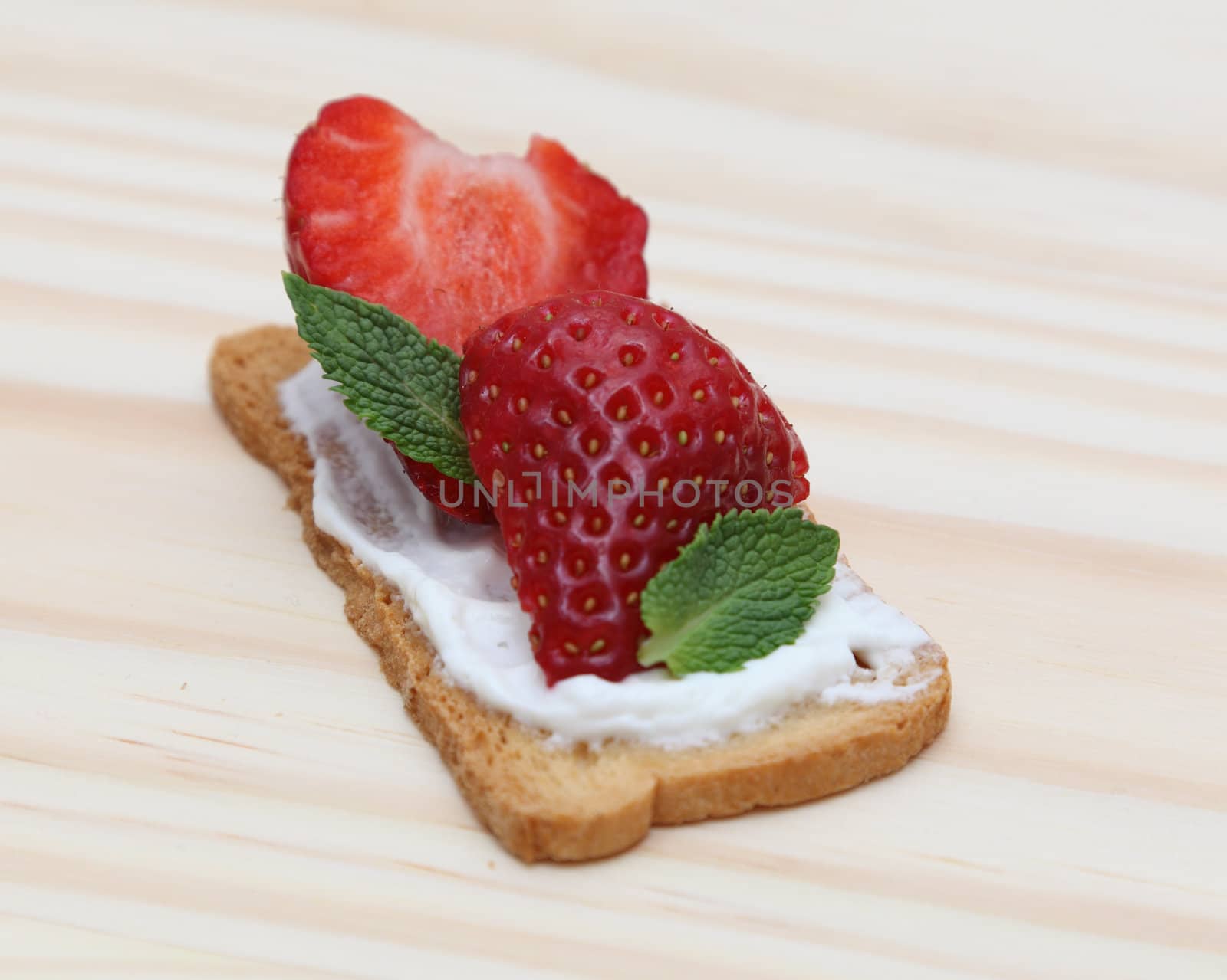 Tasty snack toast sandwich on a wooden surface.
