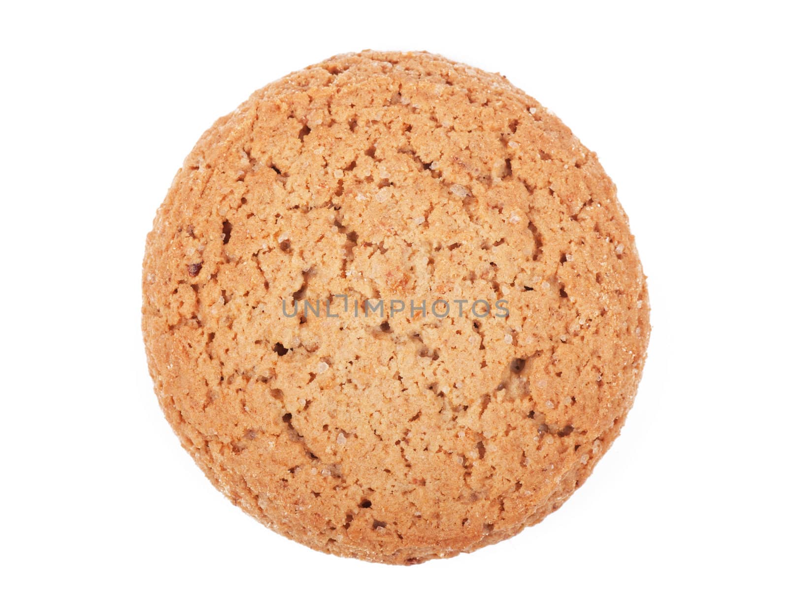 Closeup view of round oat cookie on the white background