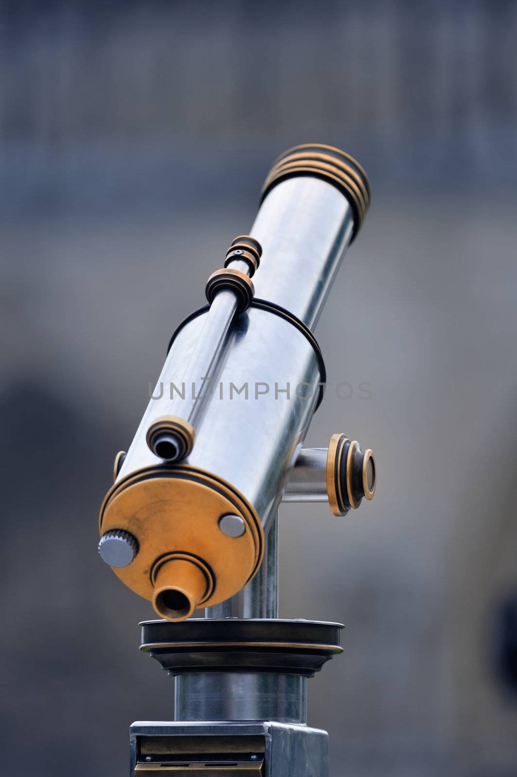 An tourist type telescope on the blur background