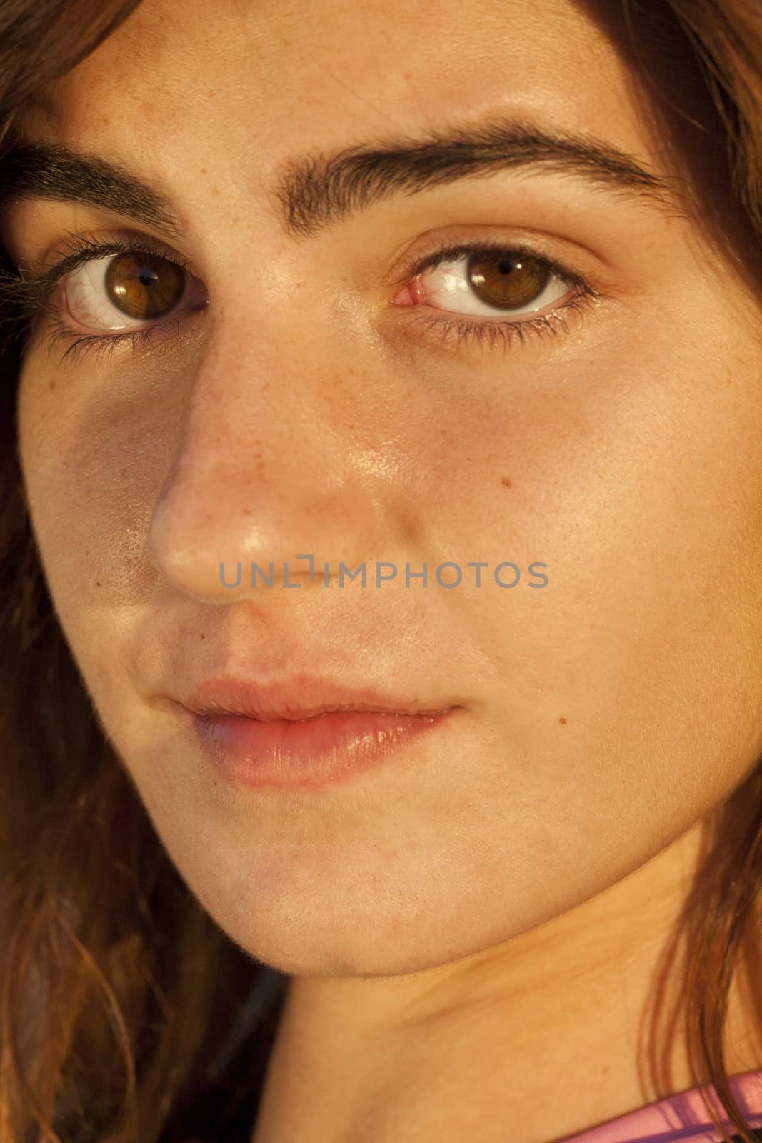 Close up view of a beautiful face of a young girl.