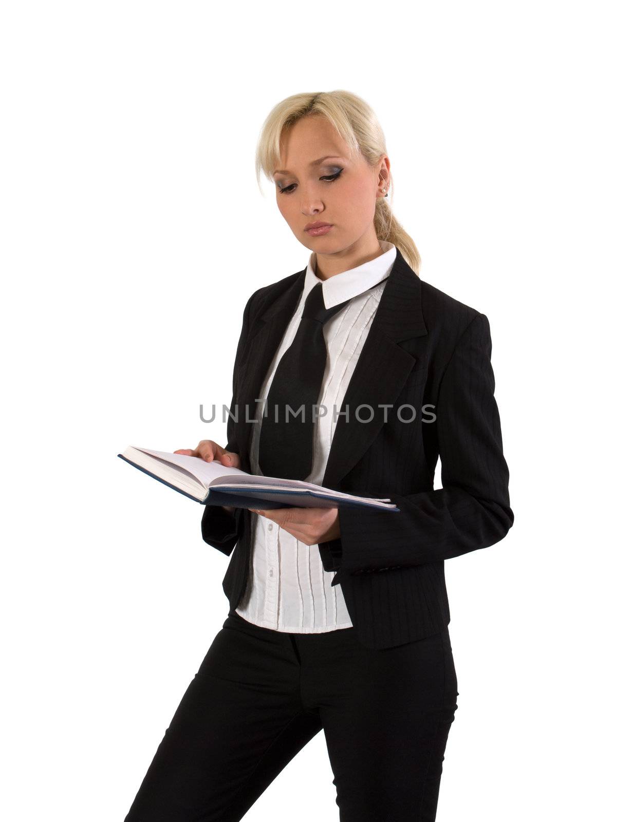 Blonde in a business suit reads diary.