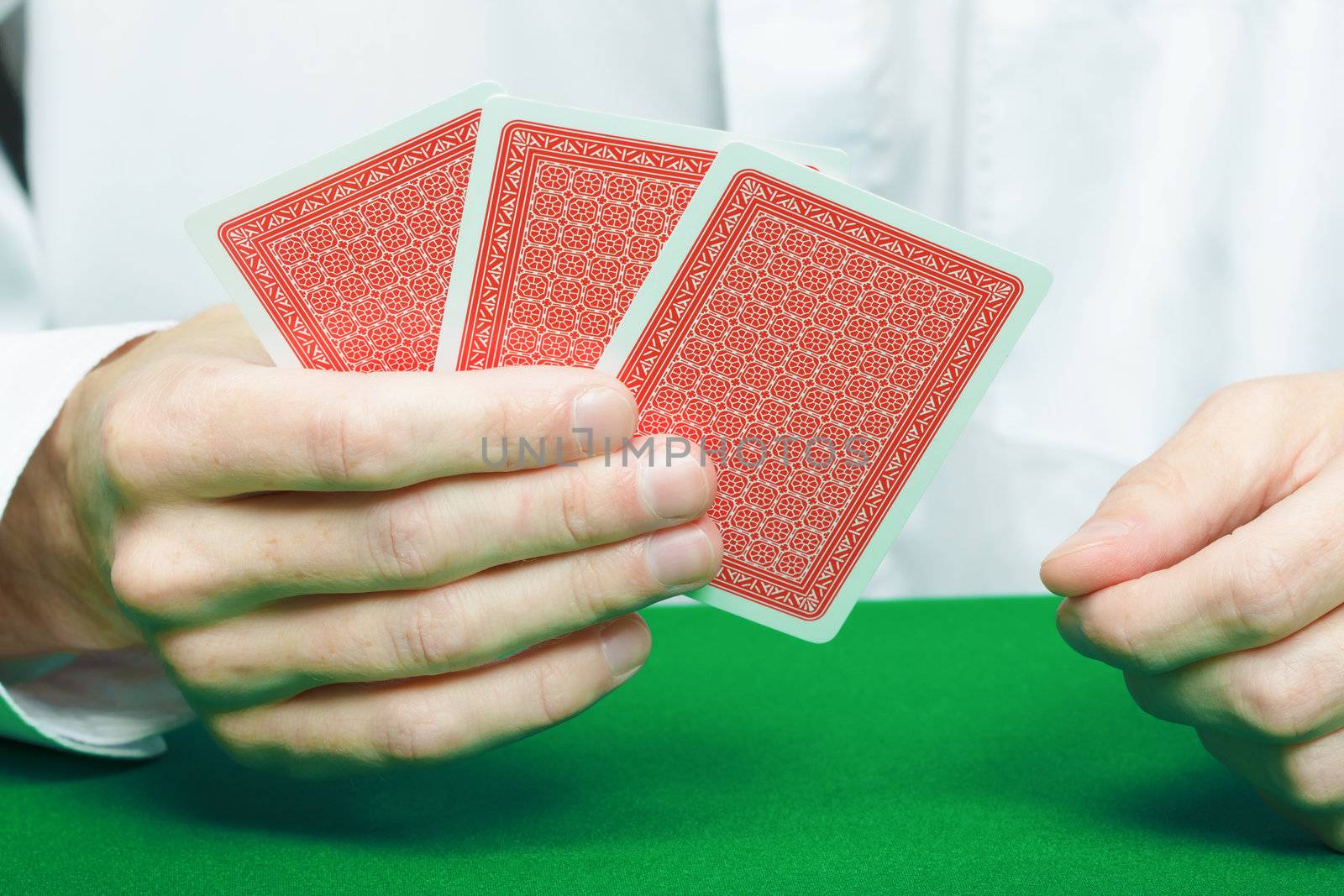 cards in the hands of gamblers. Card Game
