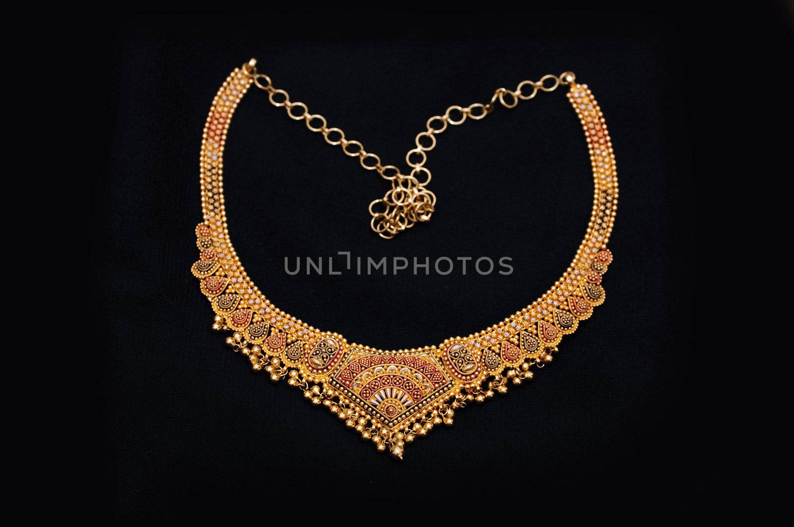 an authentic indian jewellery isolated on black background