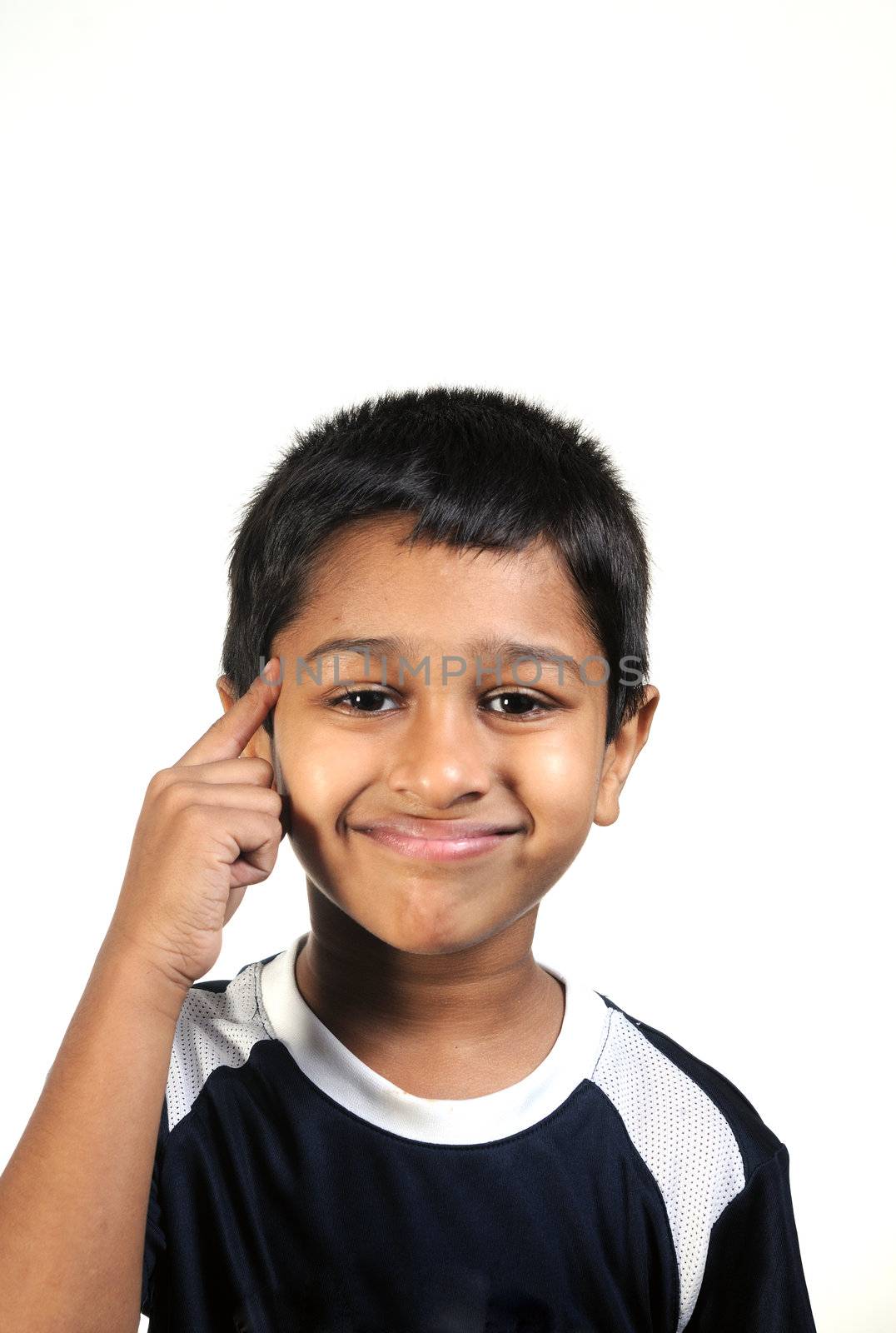 an handsome young indian kid thinking about something