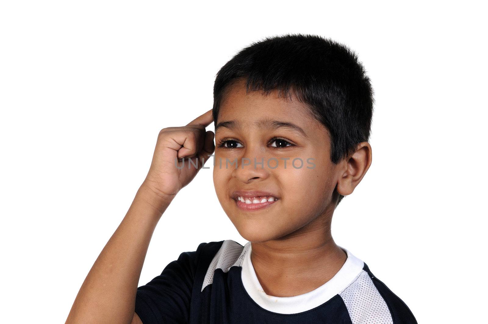 an handsome young indian kid thinking about something