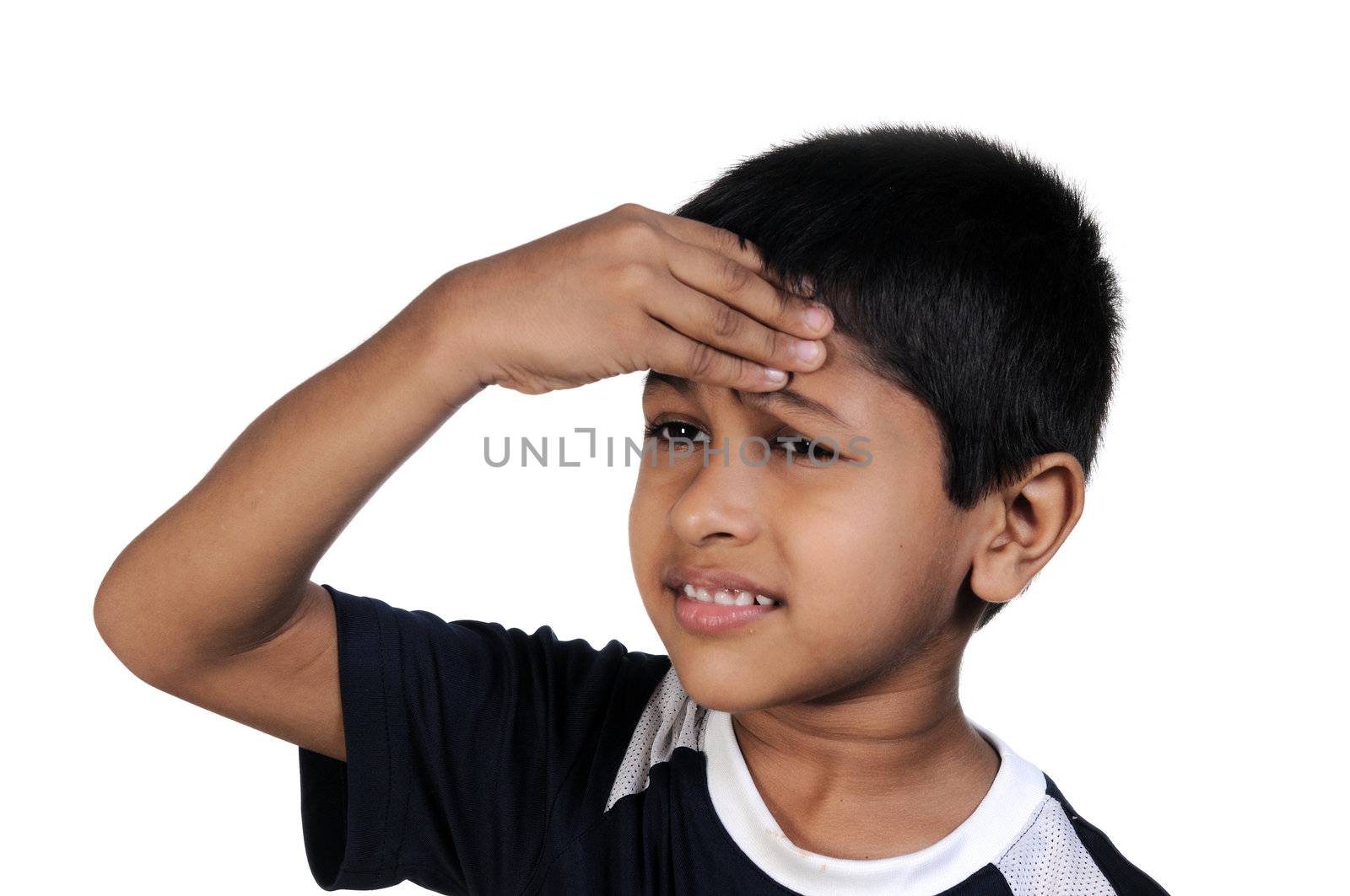 an handsome young indian kid thinking about something