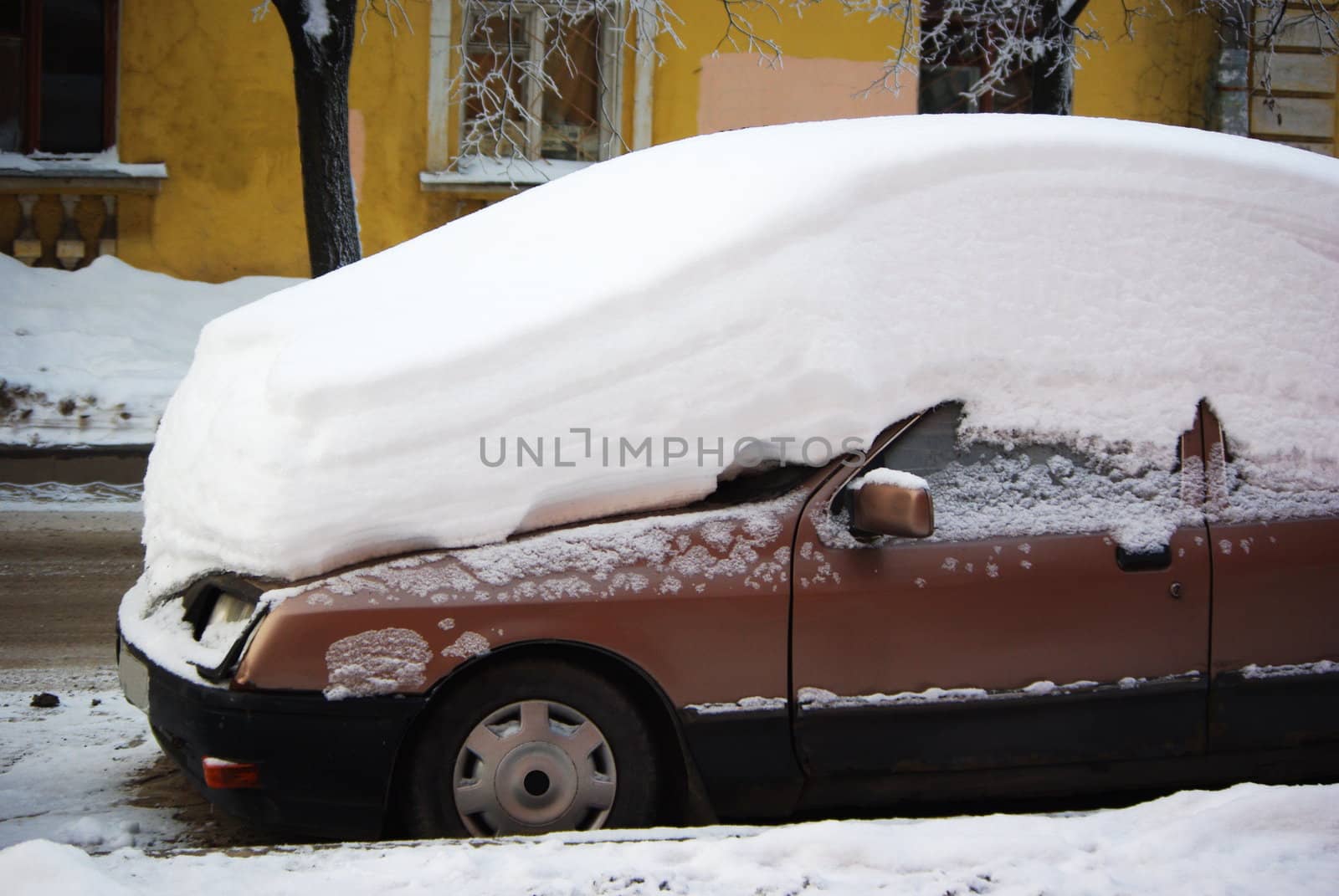 A car after strong snowfall