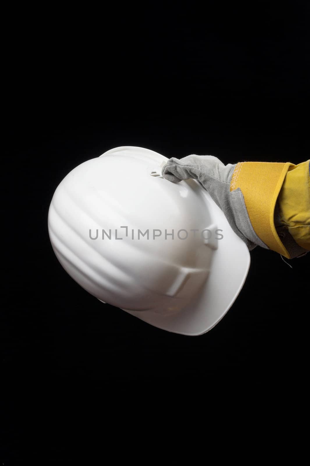 man holding red helmet over black
