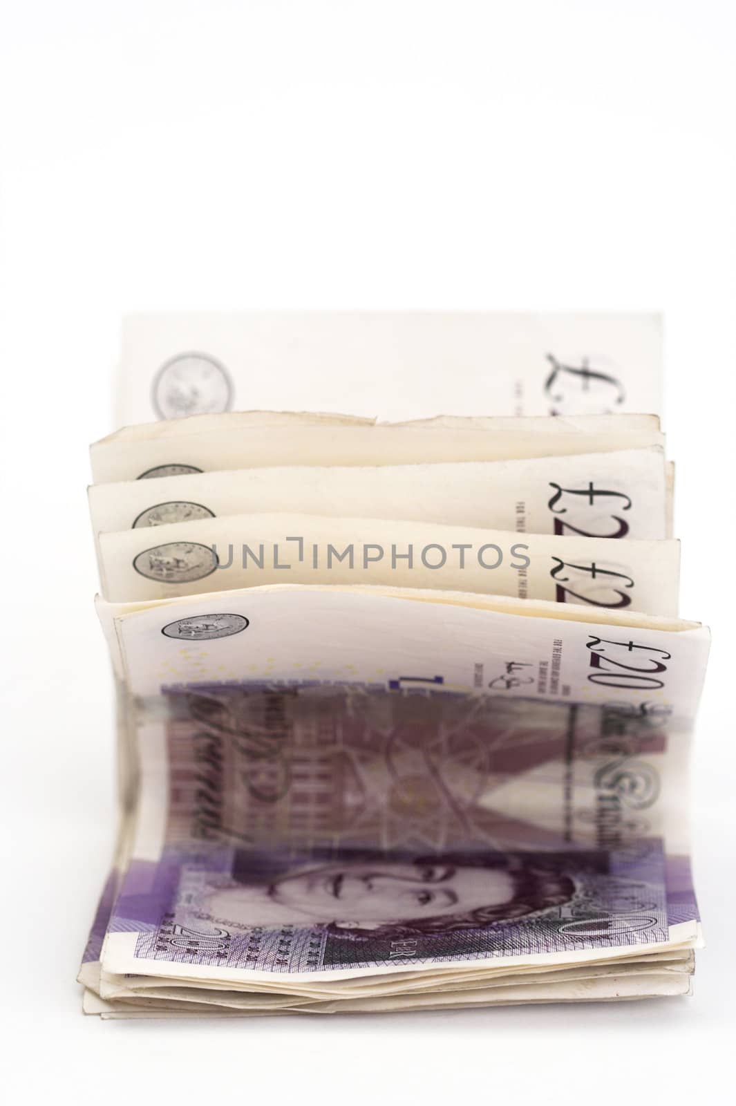 pale of twenty pound bills,shallow dof