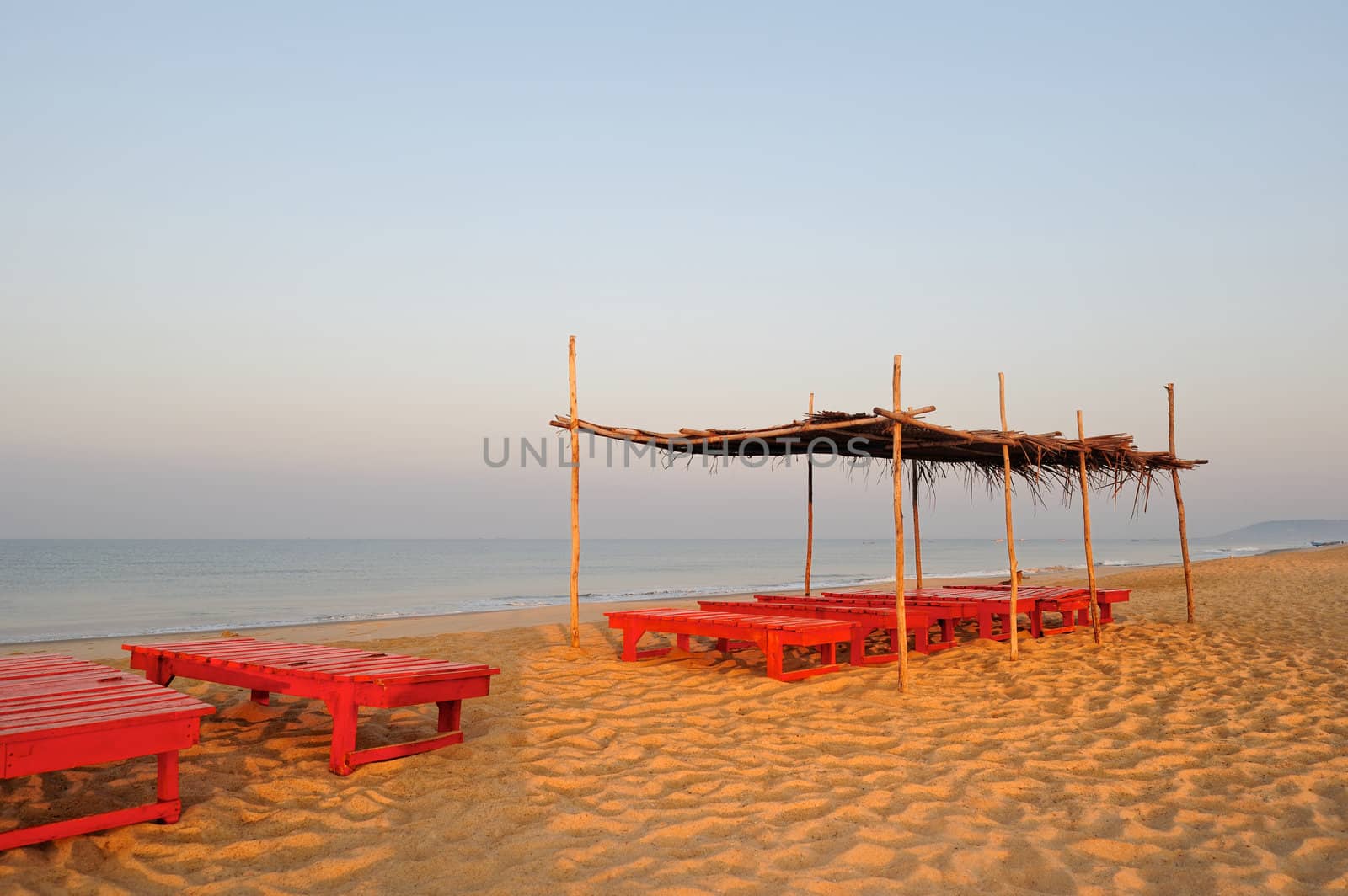 View of exotic bamboo hut on tropical beach