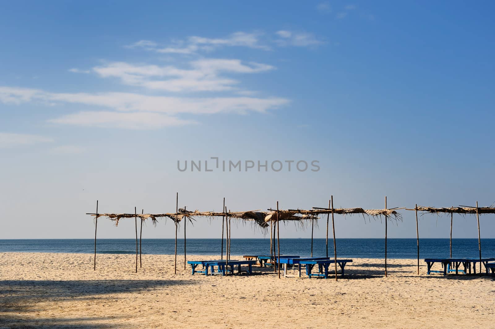 View of exotic bamboo hut on tropical beach