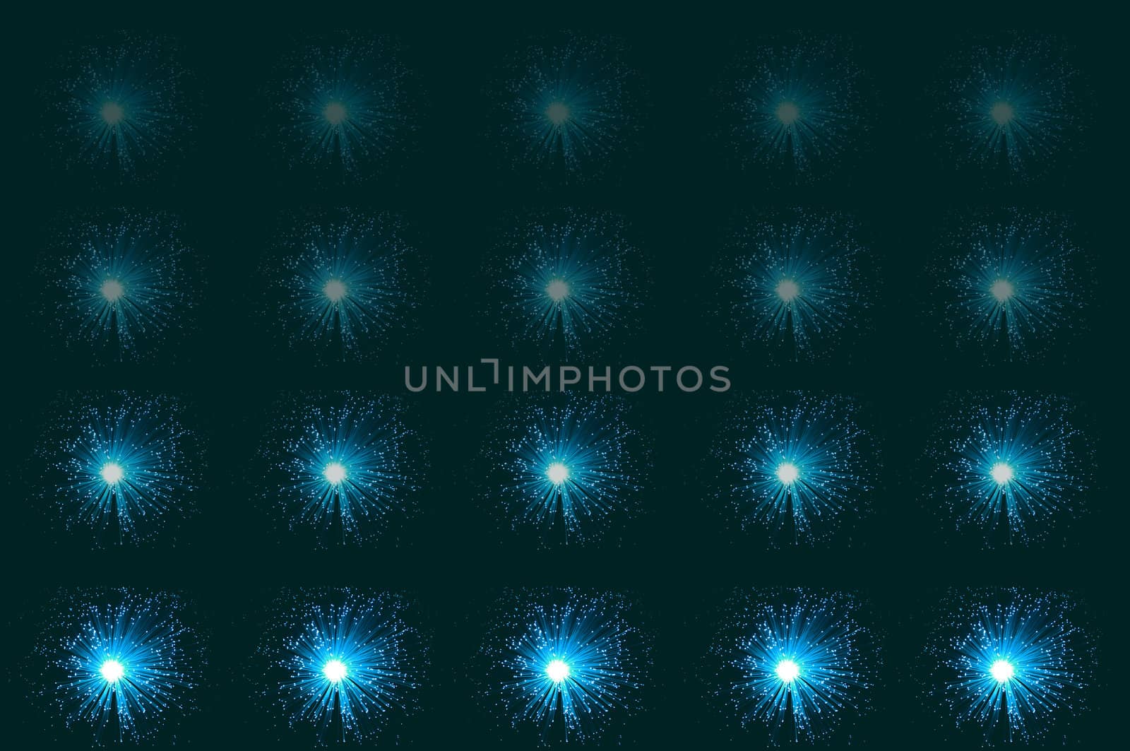 Twenty small illuminated aqua coloured fibre optic lamps in horizontal line formations with each line fading progressively towards the top of the image. Aqua-green background.