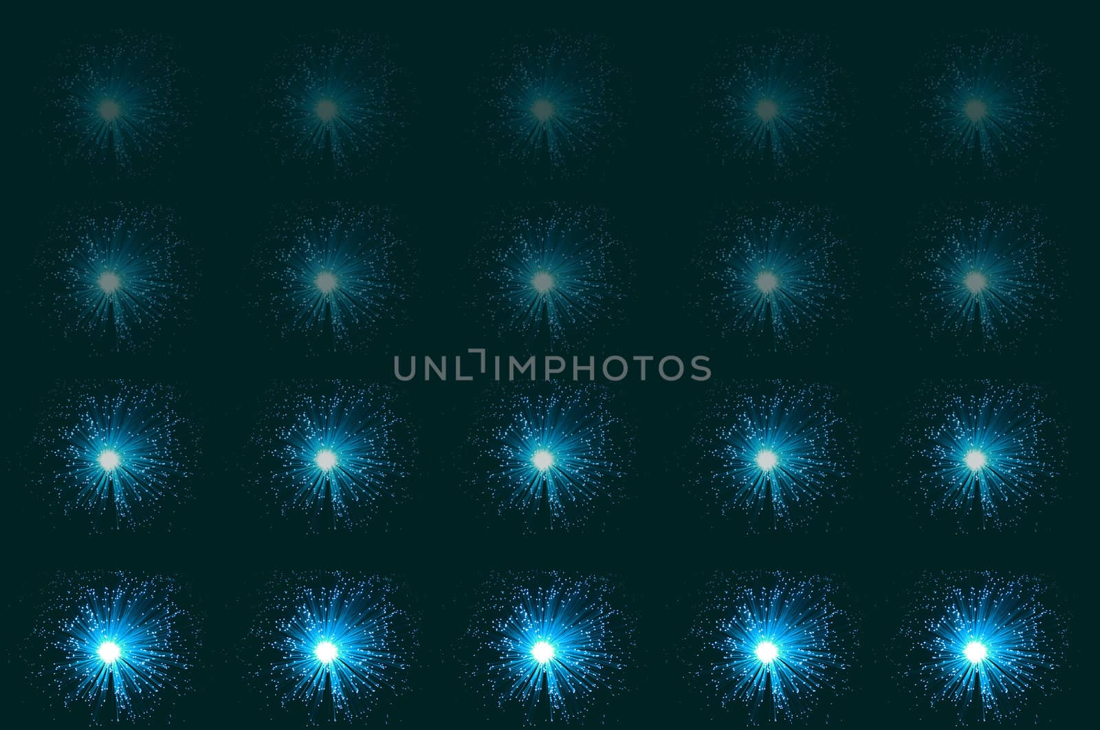 Twenty small illuminated aqua coloured fibre optic lamps in horizontal line formations with each line fading progressively towards the top of the image. Aqua-green background.