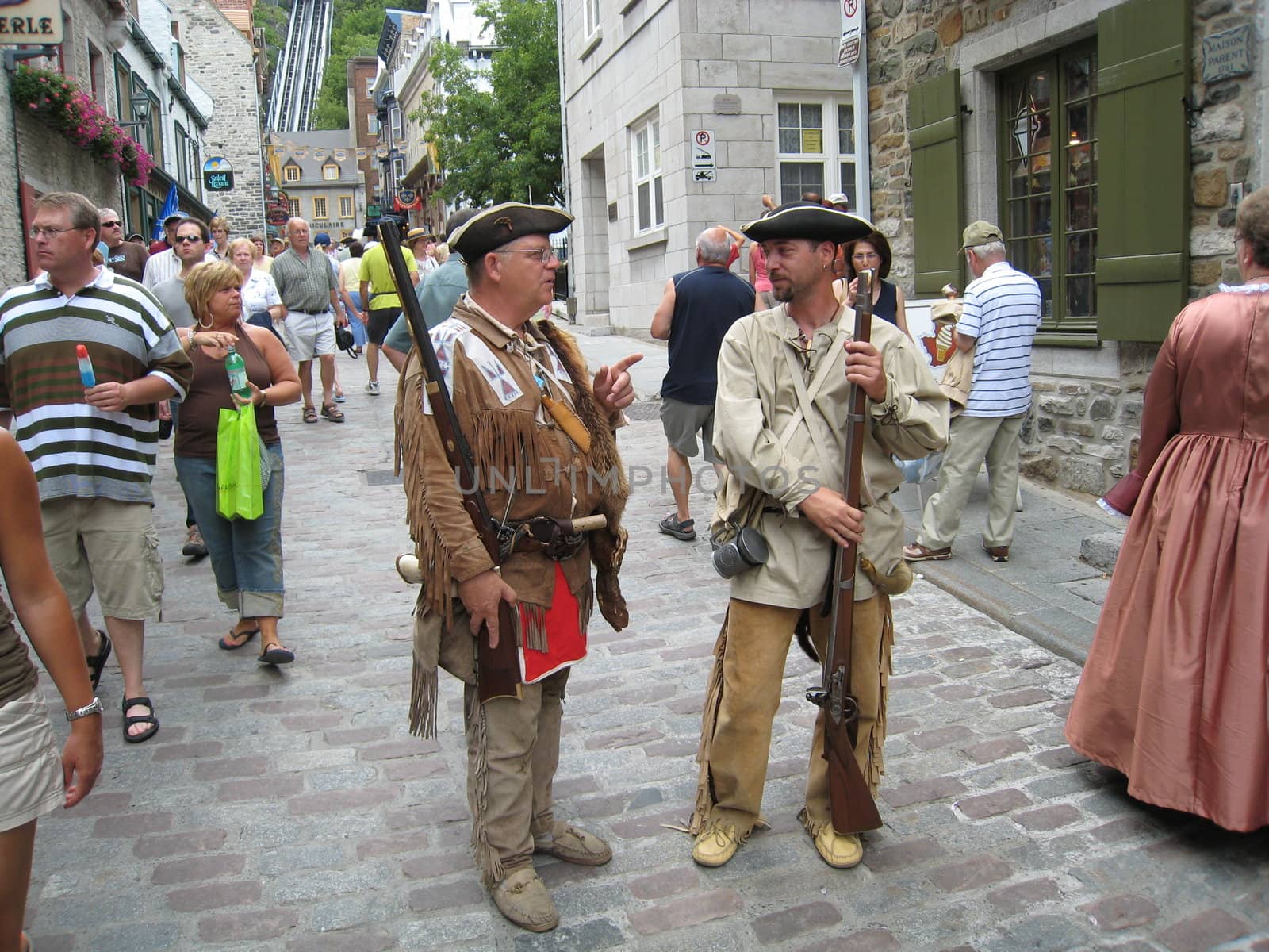 men disguised in trappers in old Quebec city