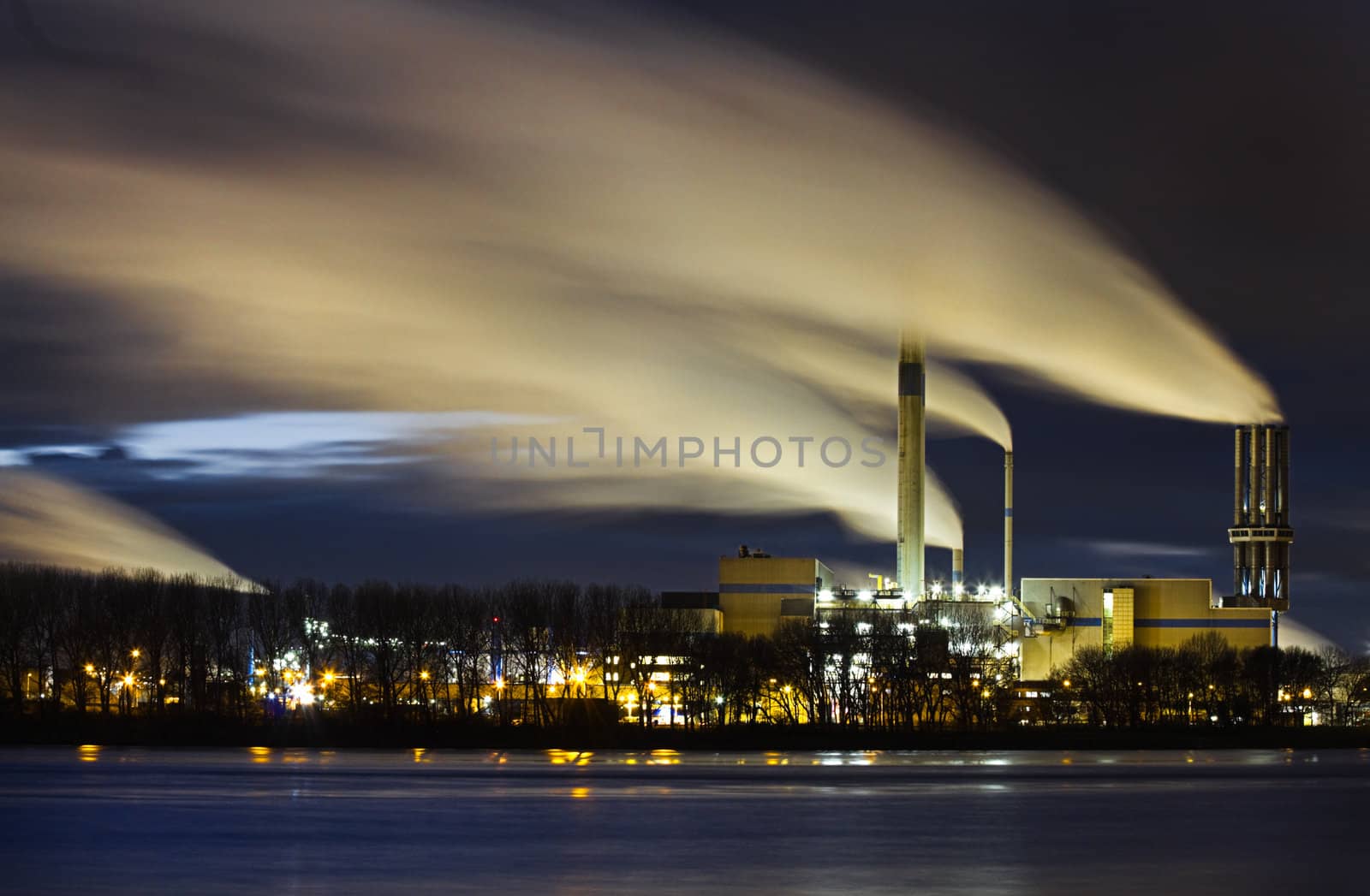 Industrial view at night -  clouds of smoke because of long exposure