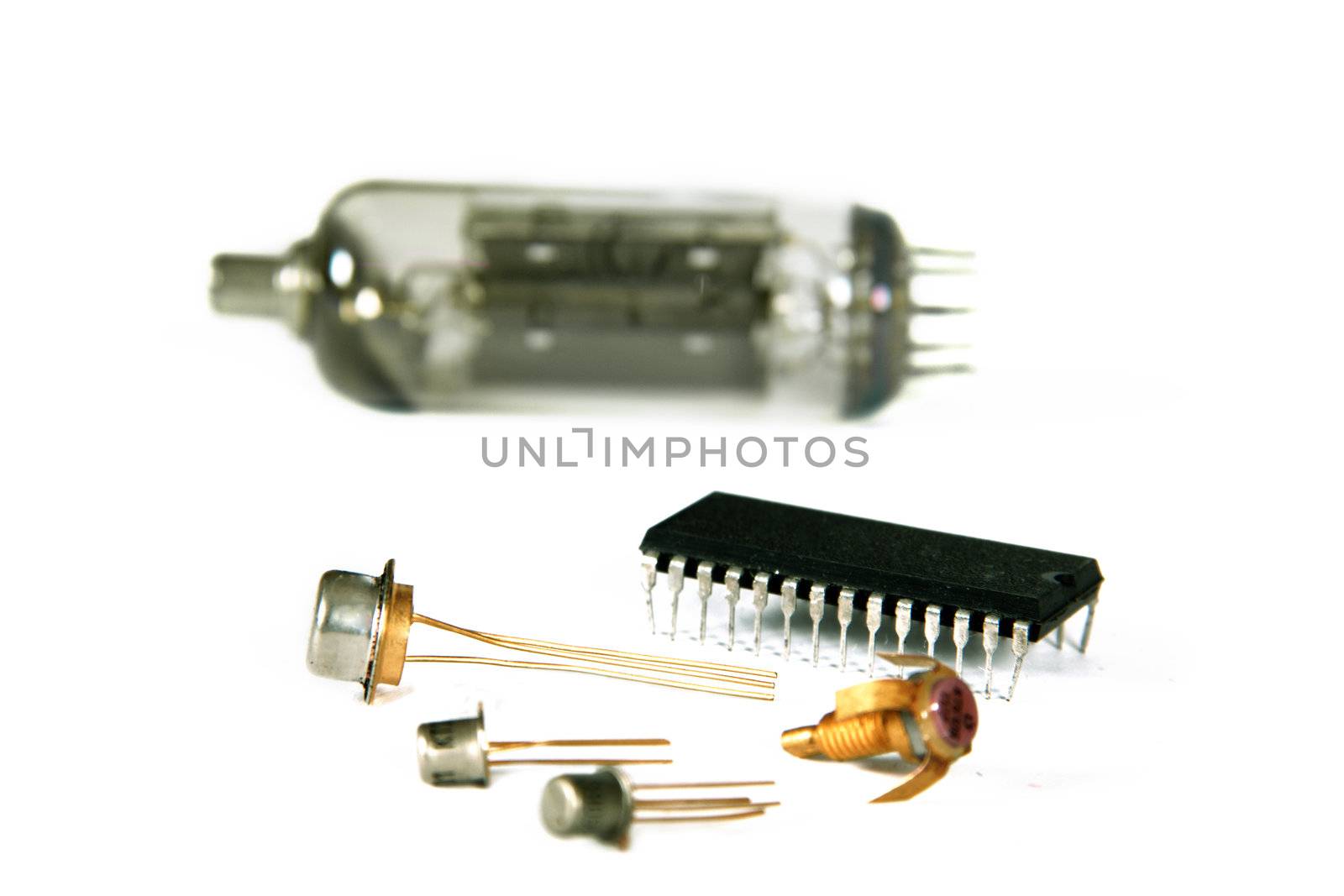 The image of modern radio components and the old radio tube, isolated, on a white background