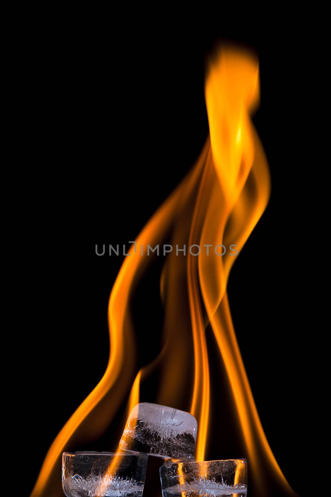 A trio of Ice cubes on fire showing flames