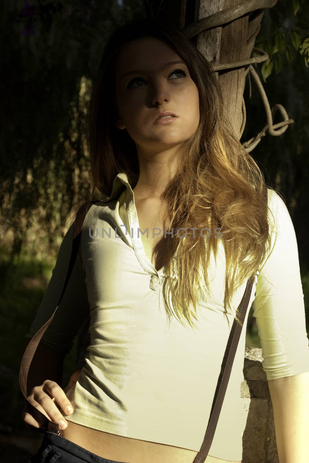 View of a beautiful blond woman posing on a fashionable way.