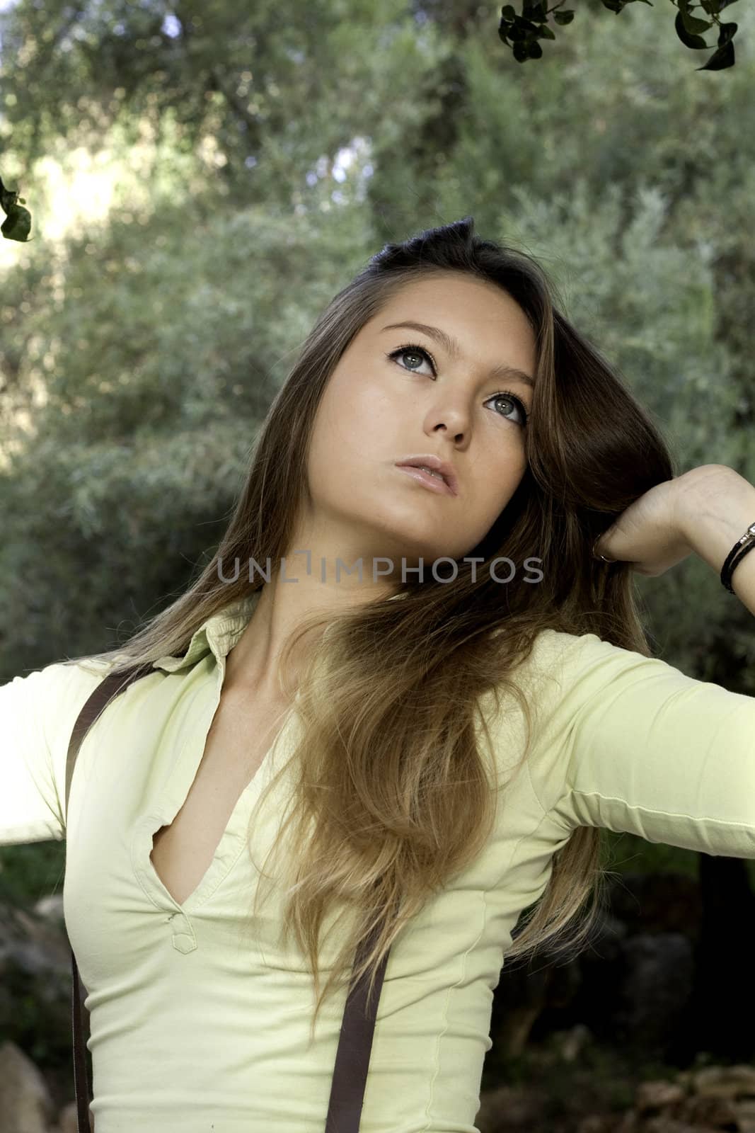 View of a beautiful blond woman posing on a fashionable way.