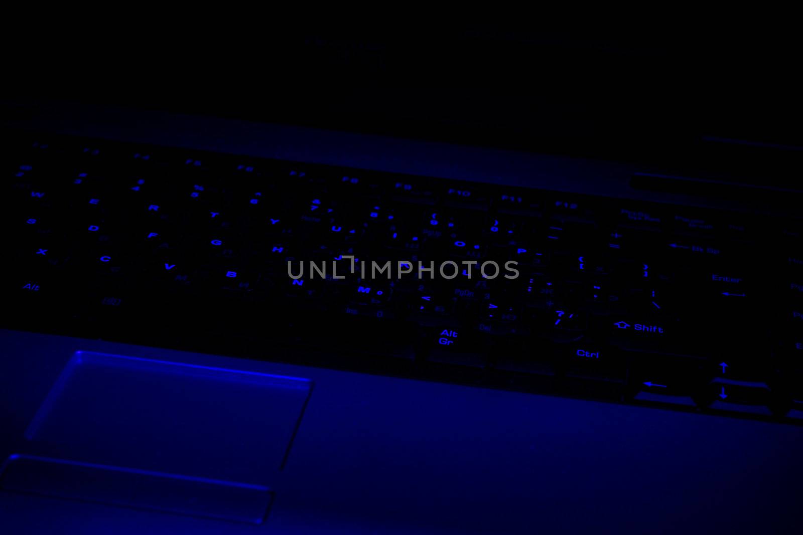 notebook keyboard in ultra-violet light