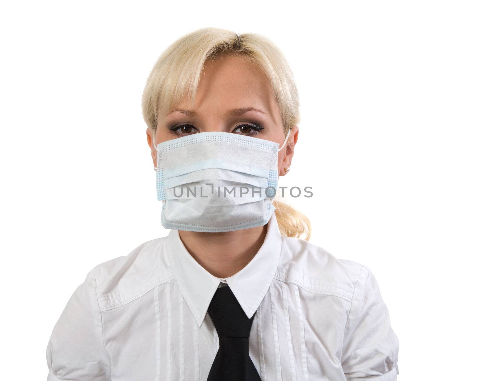 Blonde in medical mask against a white background.