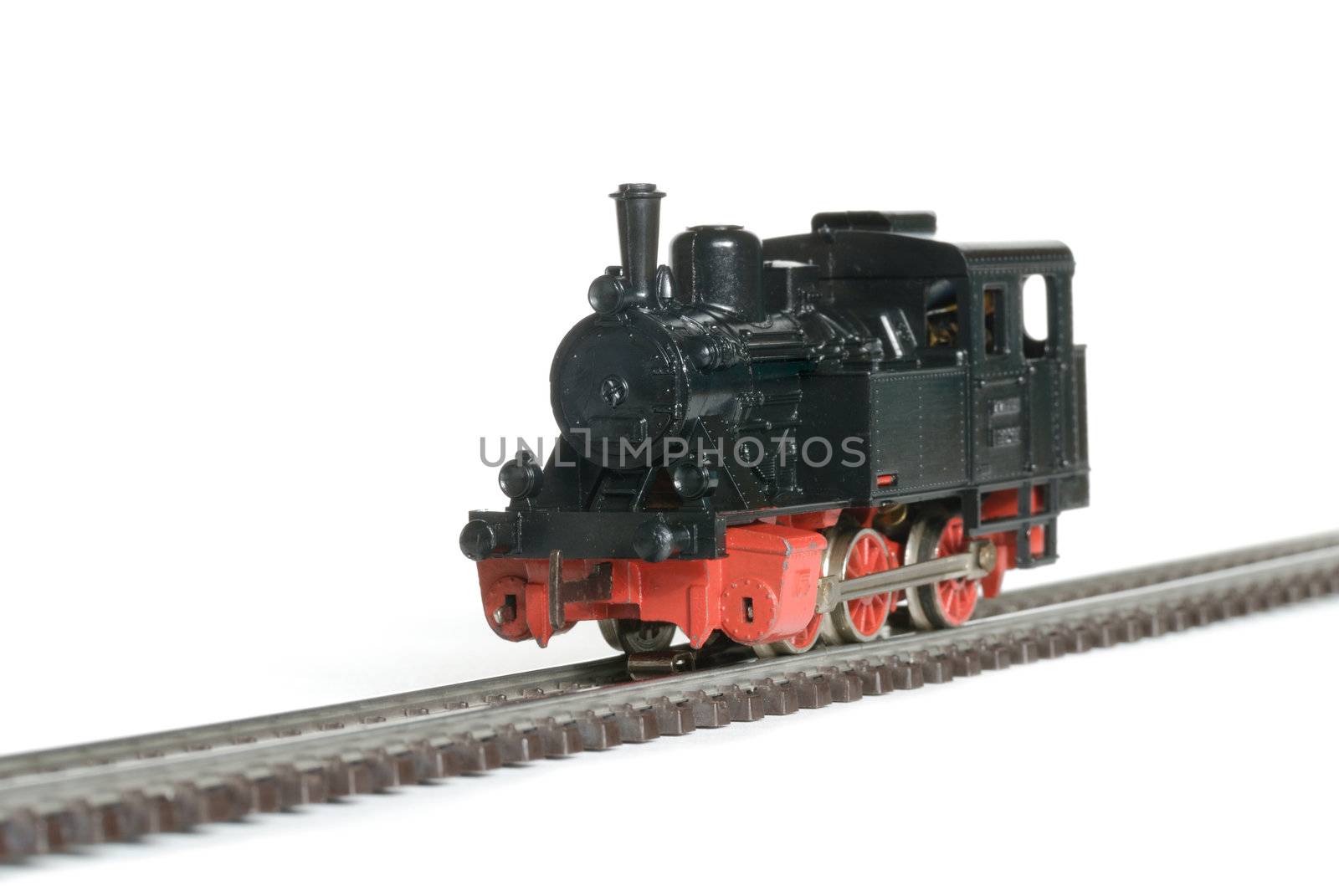 Vintage western model railway over white background