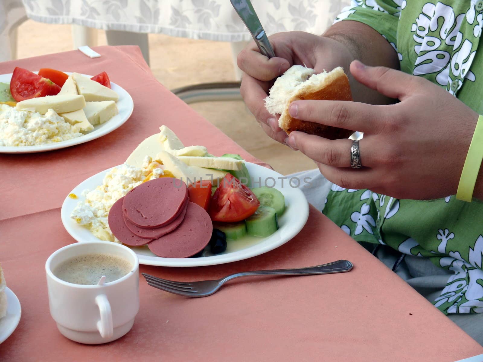 Hand break the bread in breakfast