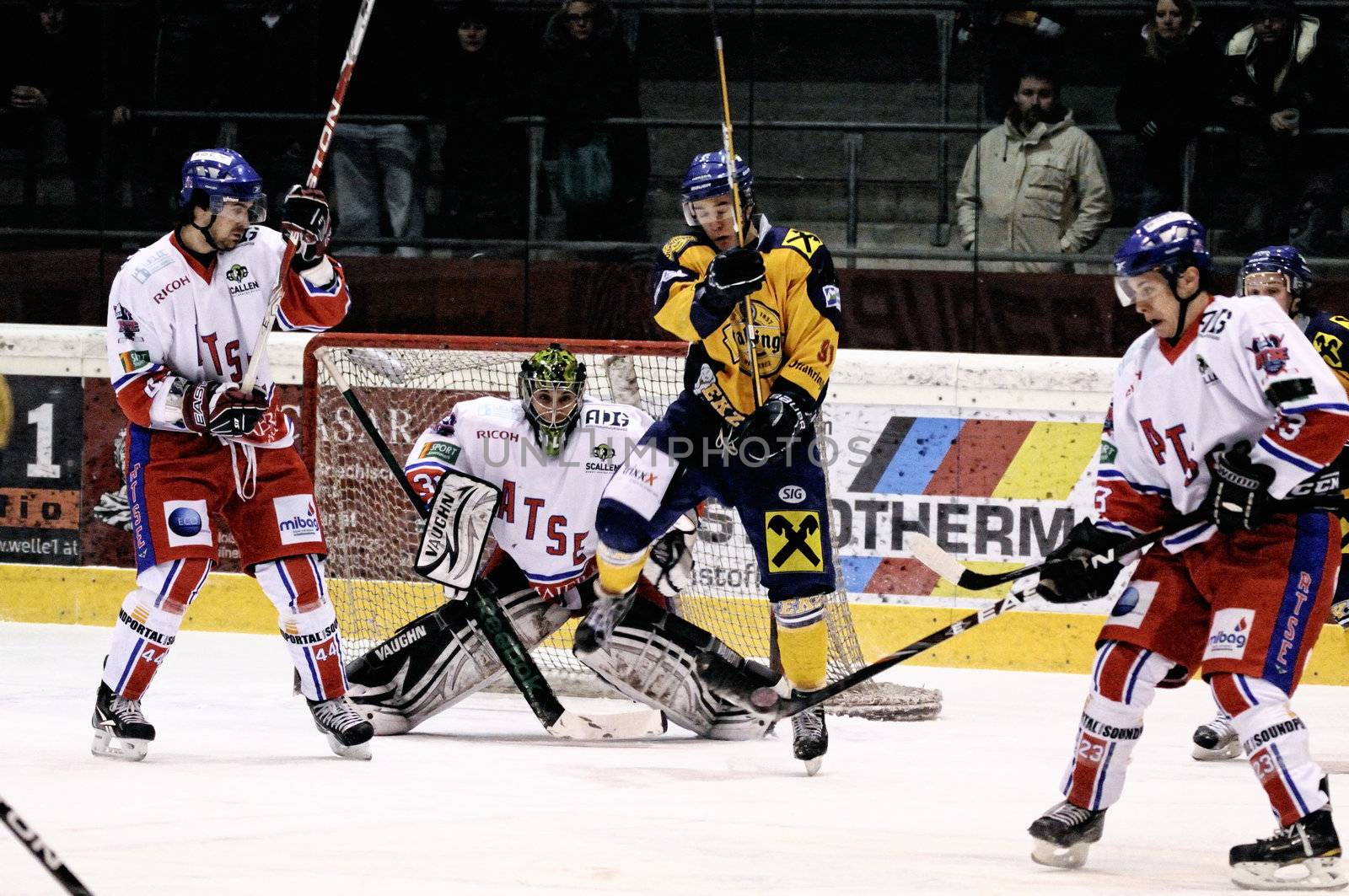 ZELL AM SEE, AUSTRIA - FEB 1: Austrian National League. Shot on Graz Keeper Ales Sila. Game EK Zell am See vs. ATSE Graz (Result 4-1) on February 1, 2011, at hockey rink of Zell am See