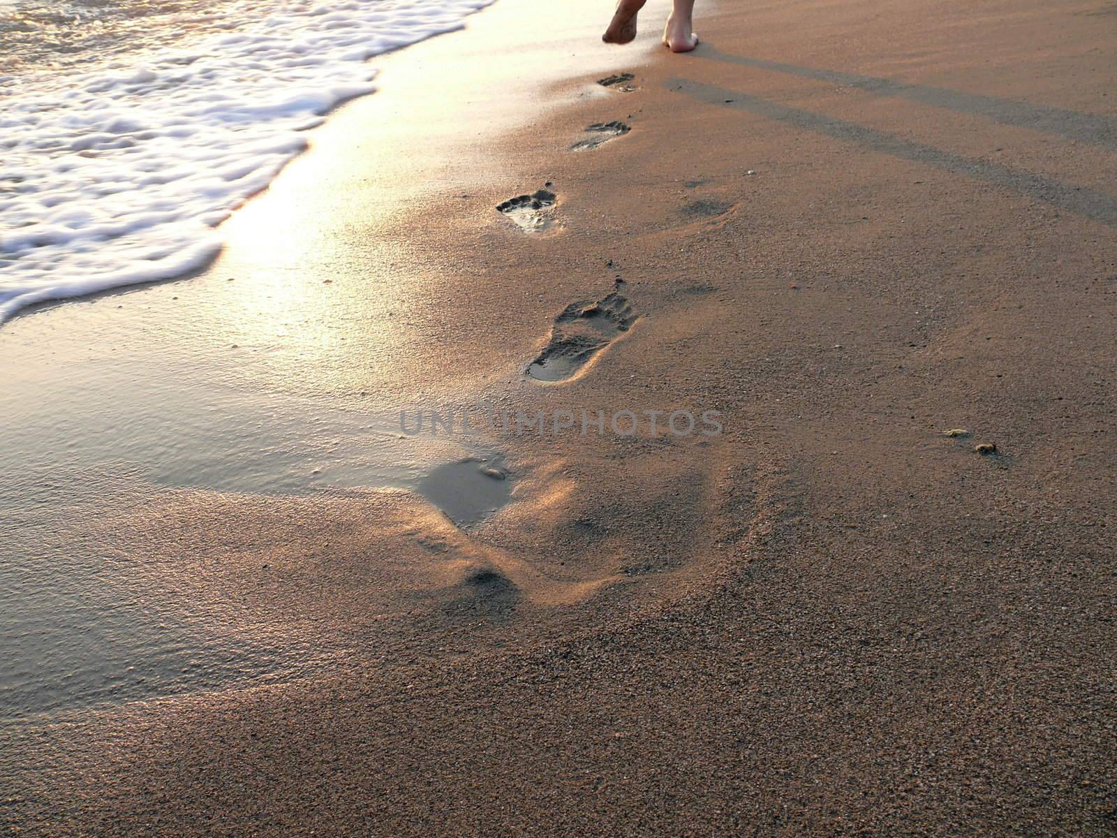 Fresh footprint in the surf line by Stoyanov