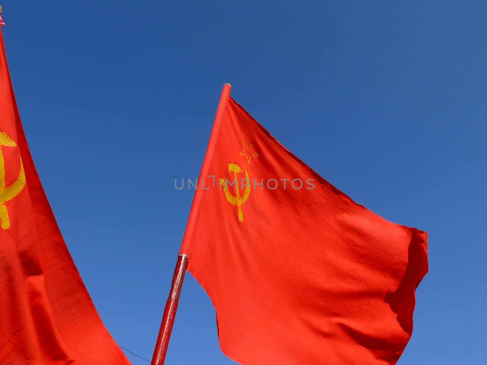 Old communistic flags with sickle and hammer