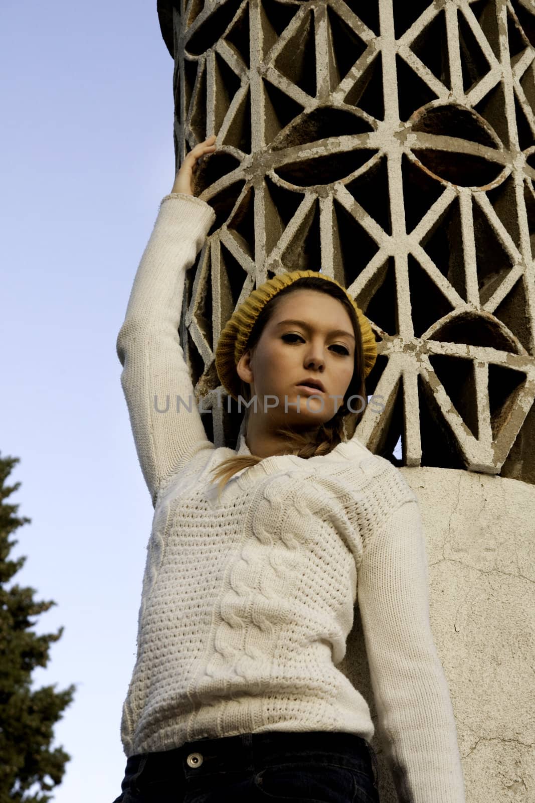 View of a beautiful blond woman posing on a fashionable way.