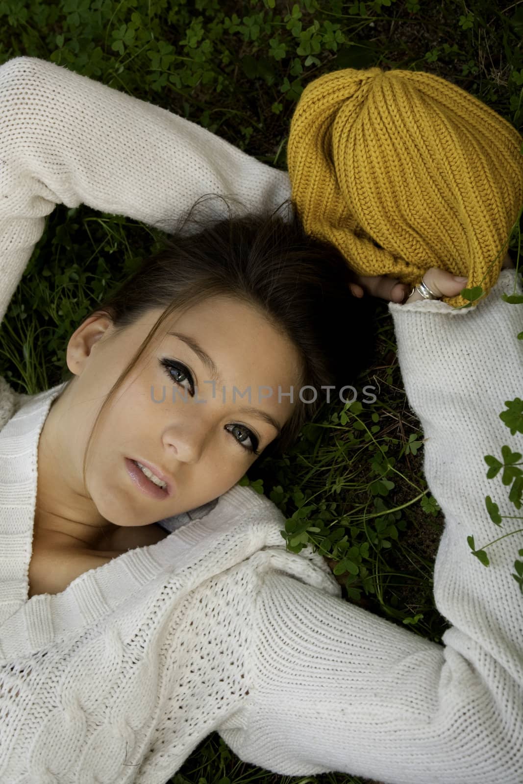 View of a beautiful blond woman posing on a fashionable way.