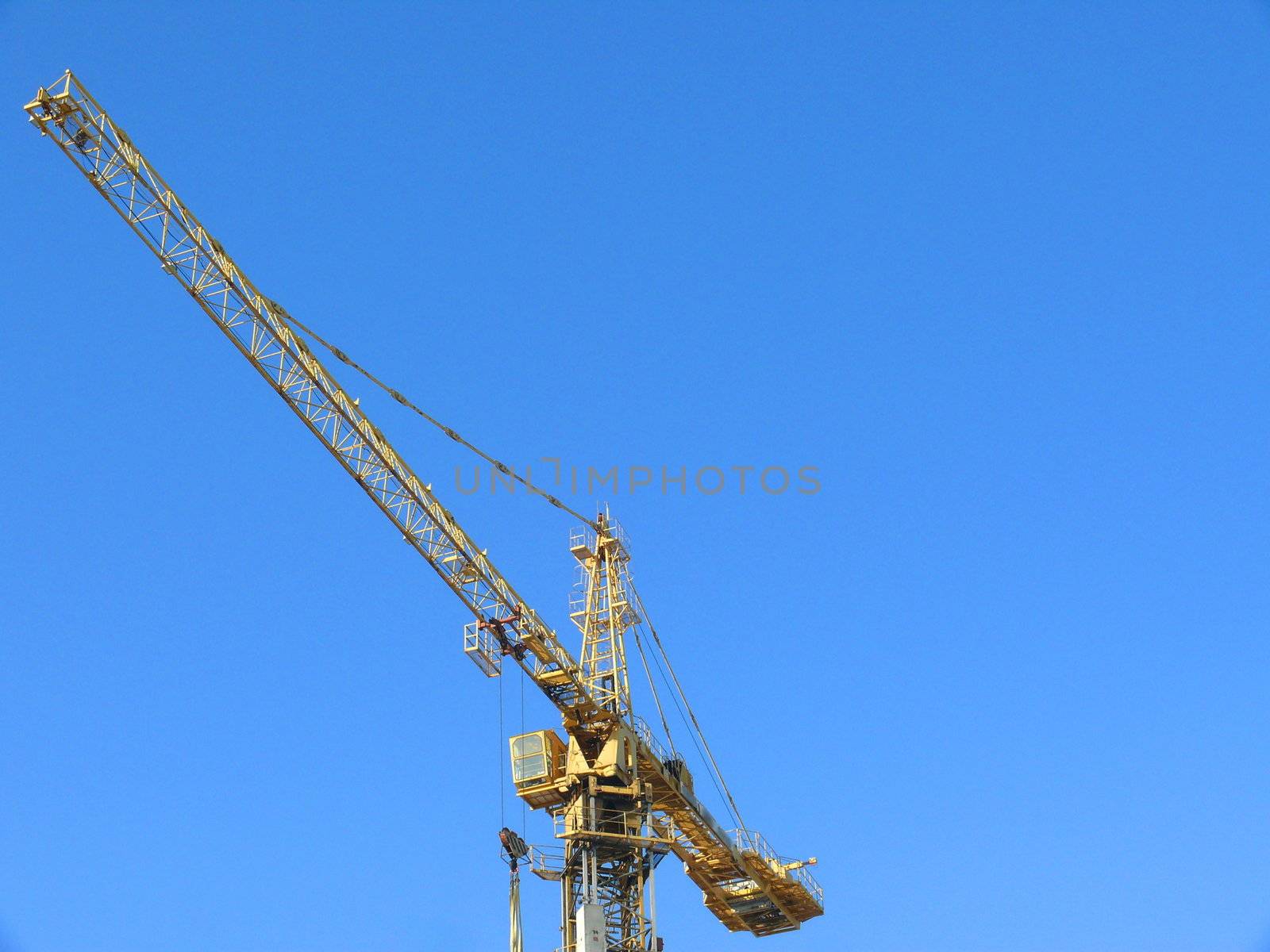 Tower crane in the city by Stoyanov