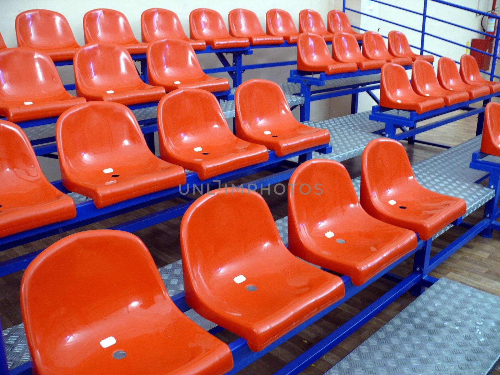 Red seats in ice area