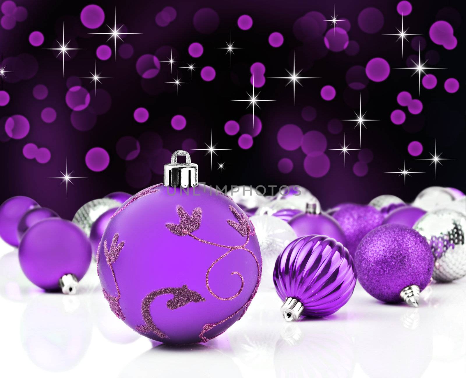 Purple decorative christmas ornaments with star background by tish1