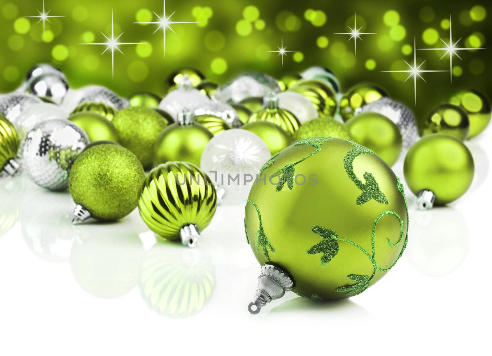 Green christmas ornament baubles with star background