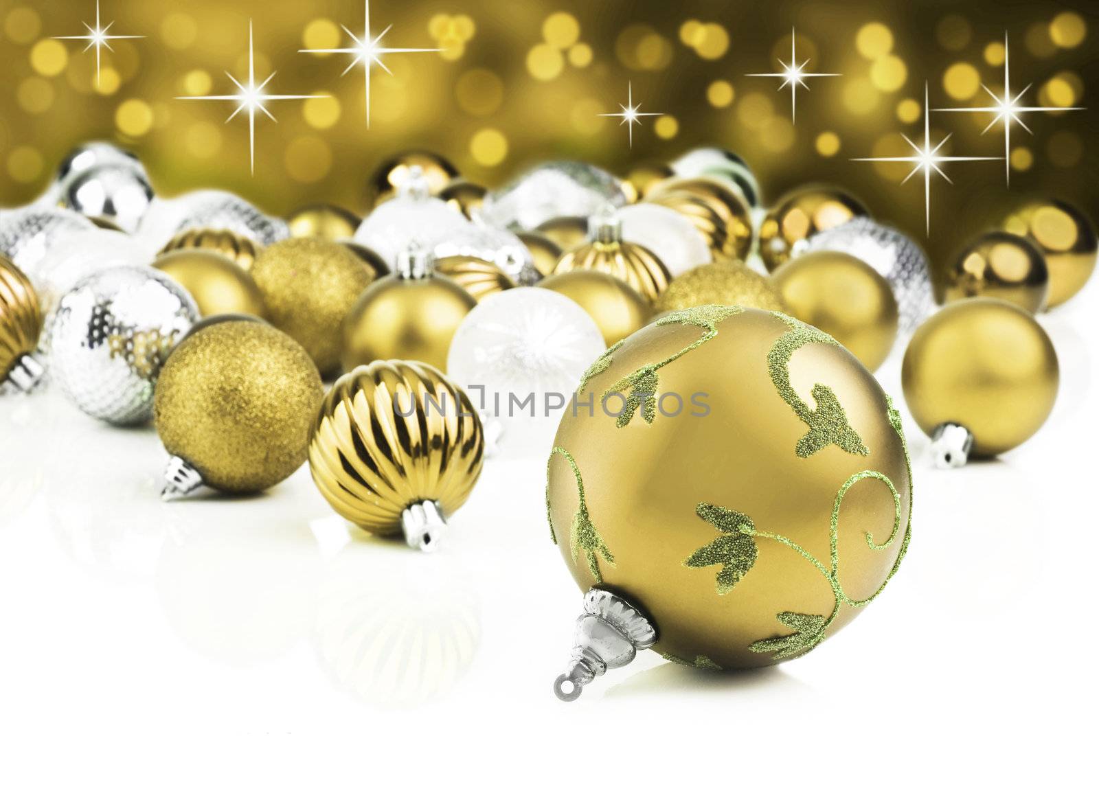 Golden decorative christmas ornaments with star background by tish1