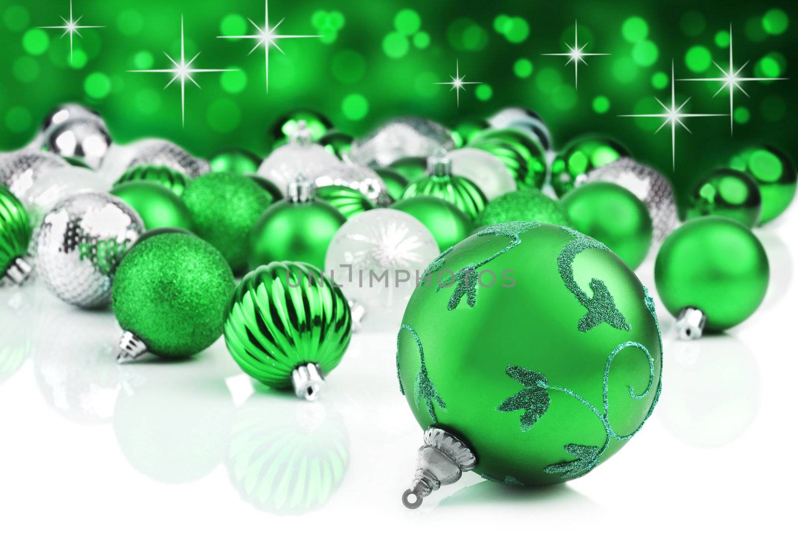 Green christmas ornament baubles with star background by tish1