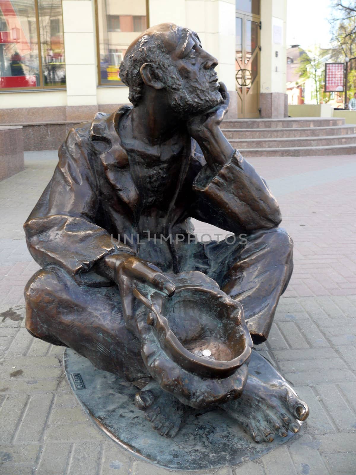 Monument of beggar man in Chelyabinsk by Stoyanov