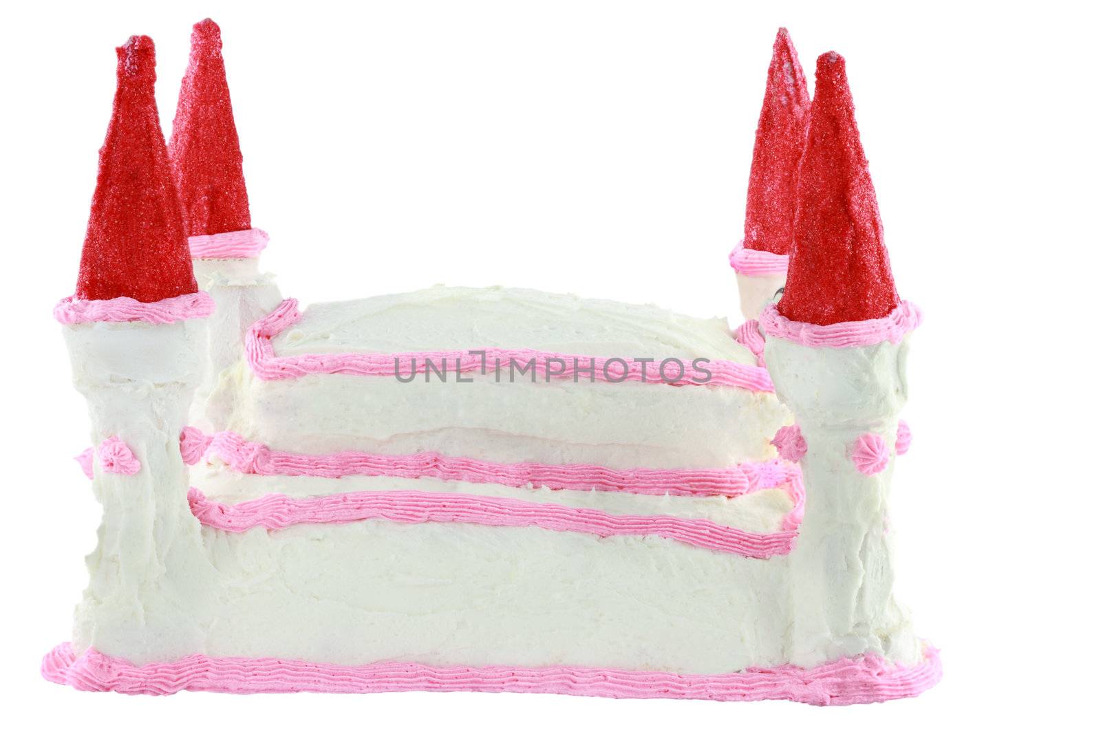 Birthday cake in the shape of a castle isolated on a white background.