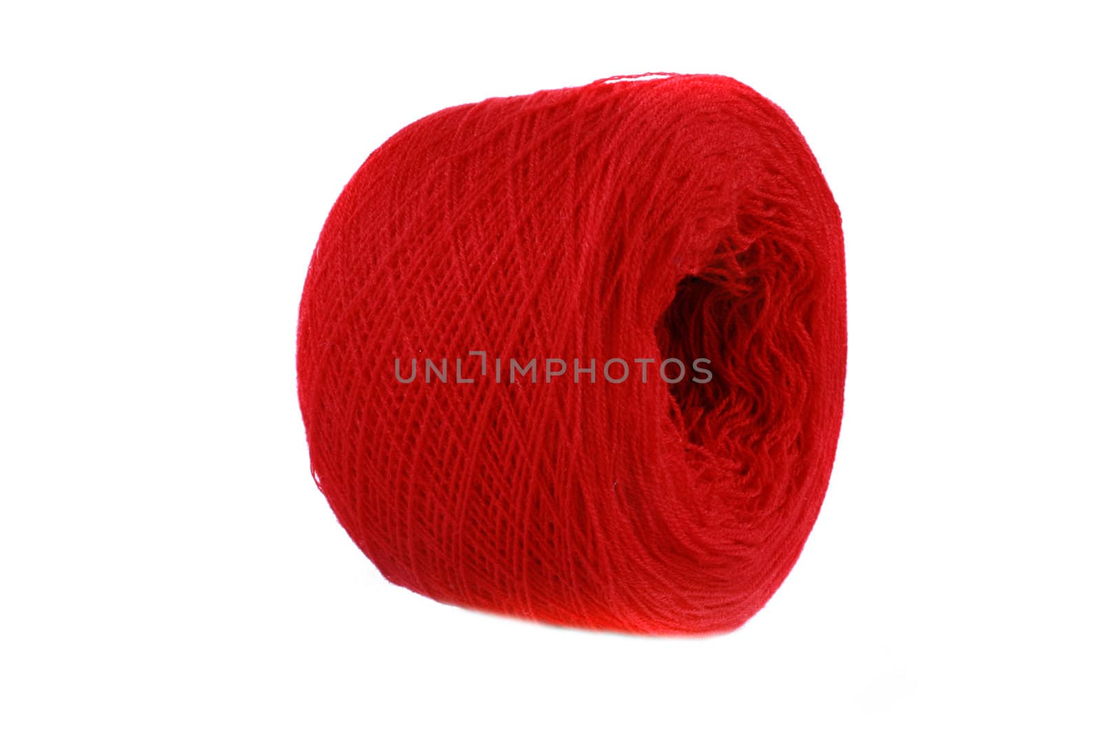 A bale of red wool, isolated on white background.