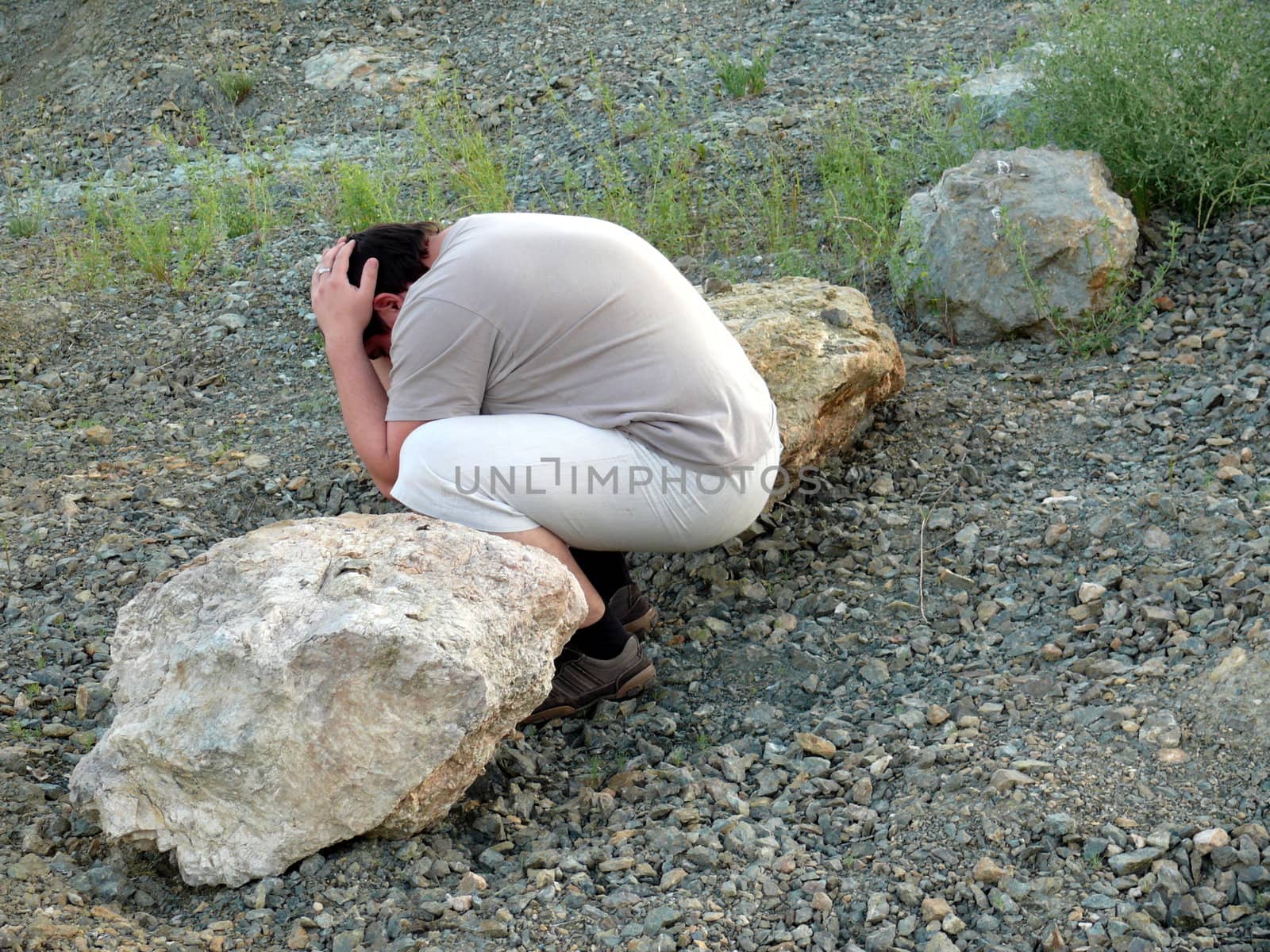 man pretending to be a stone by Stoyanov