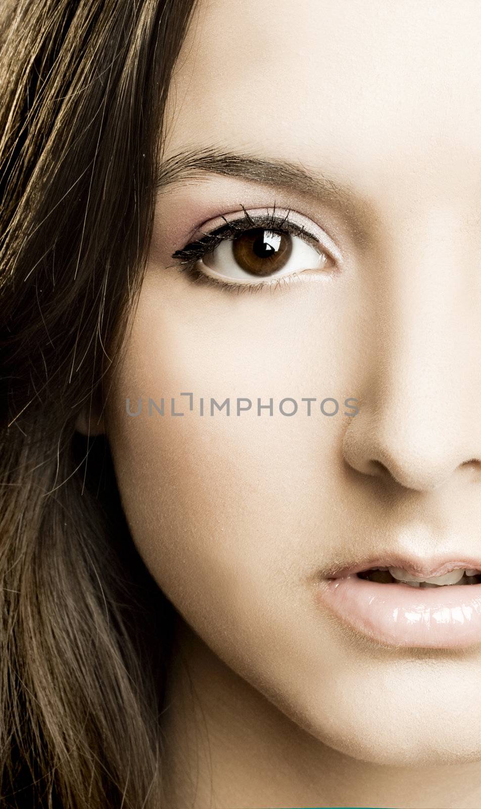 Close-up of beautiful woman face with perfect makeup 
