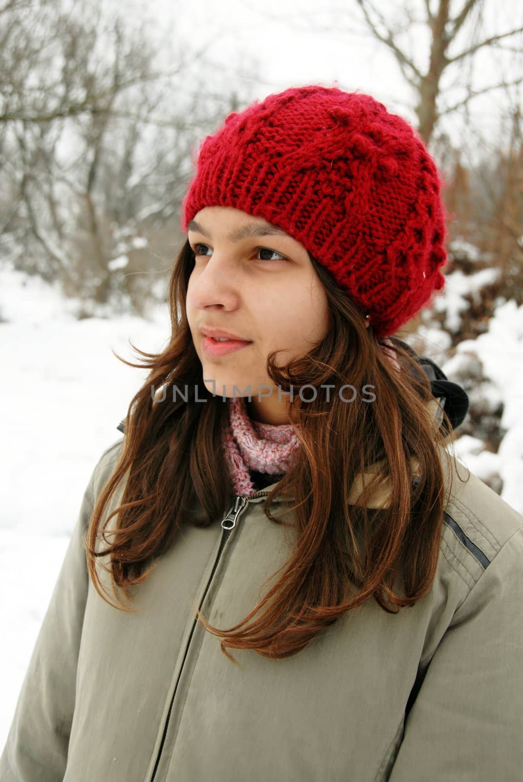 teenage smiling caucasian girl in red cup outdoor